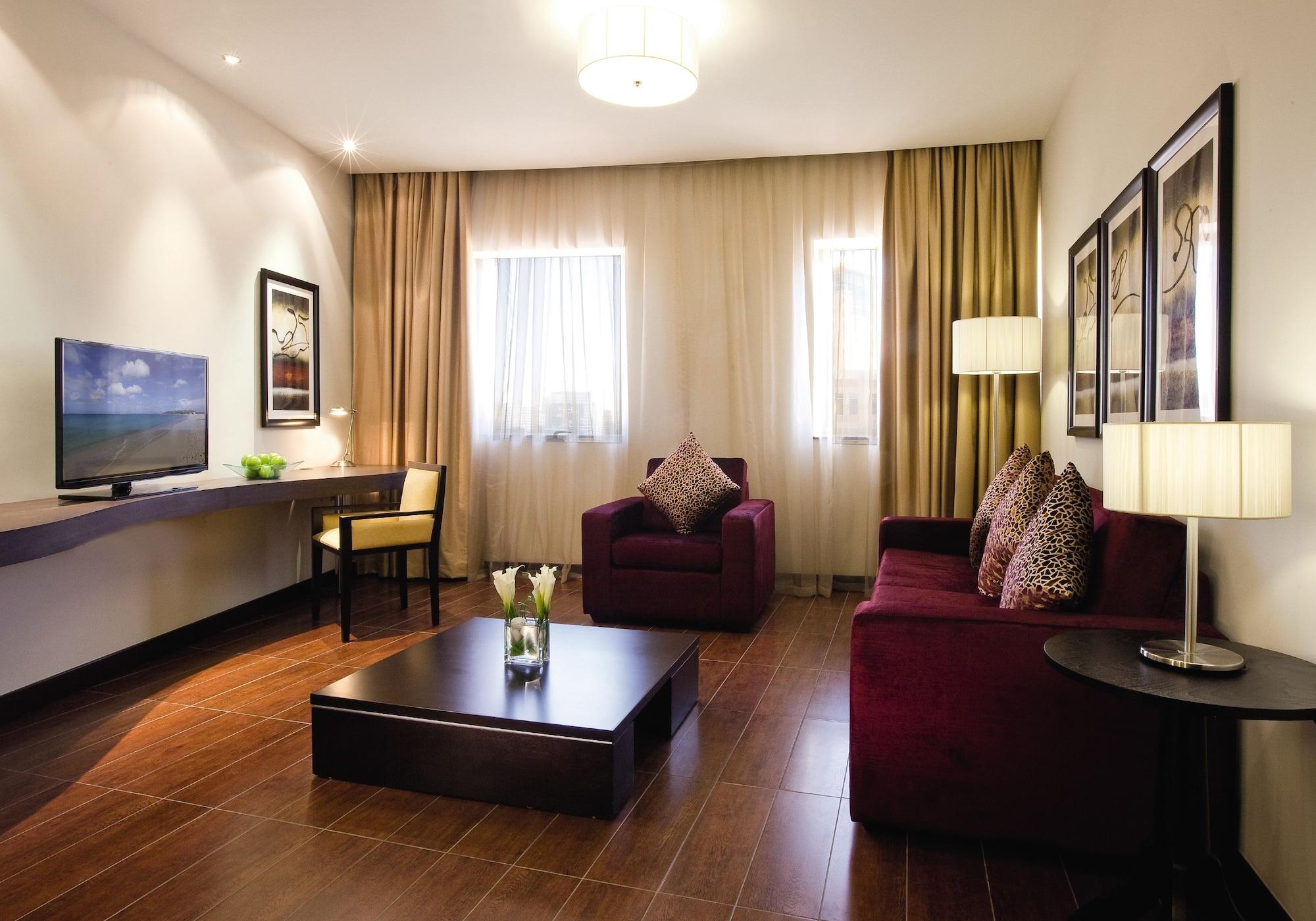 Moevenpick Hotel Apartments Al Mamzar Dubai Bagian luar foto Living room