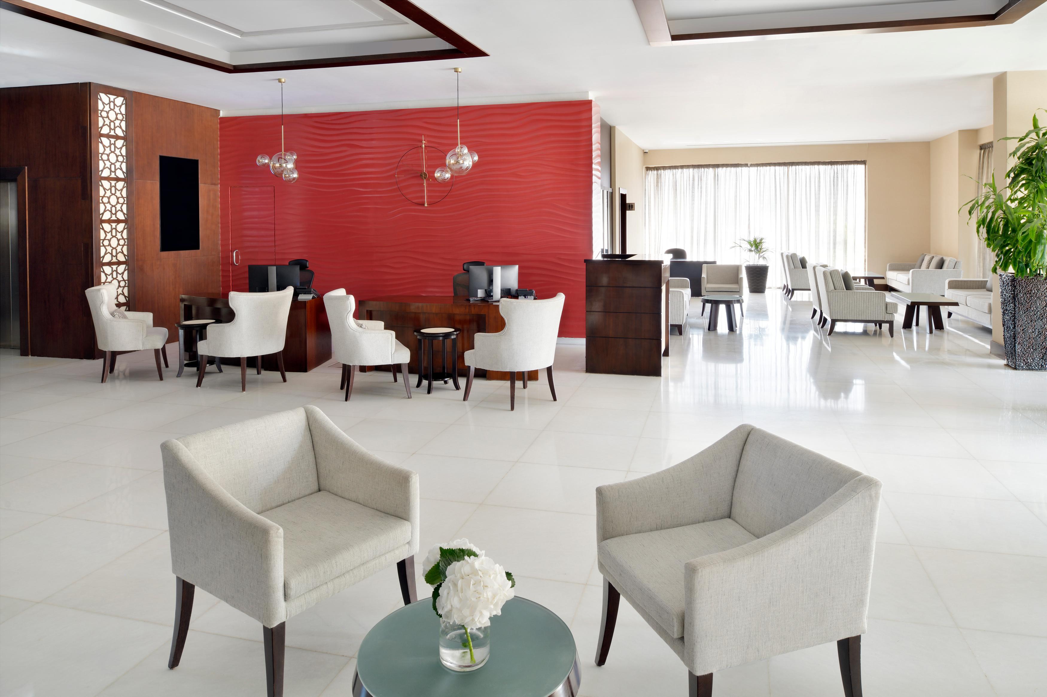 Moevenpick Hotel Apartments Al Mamzar Dubai Bagian luar foto Lobby