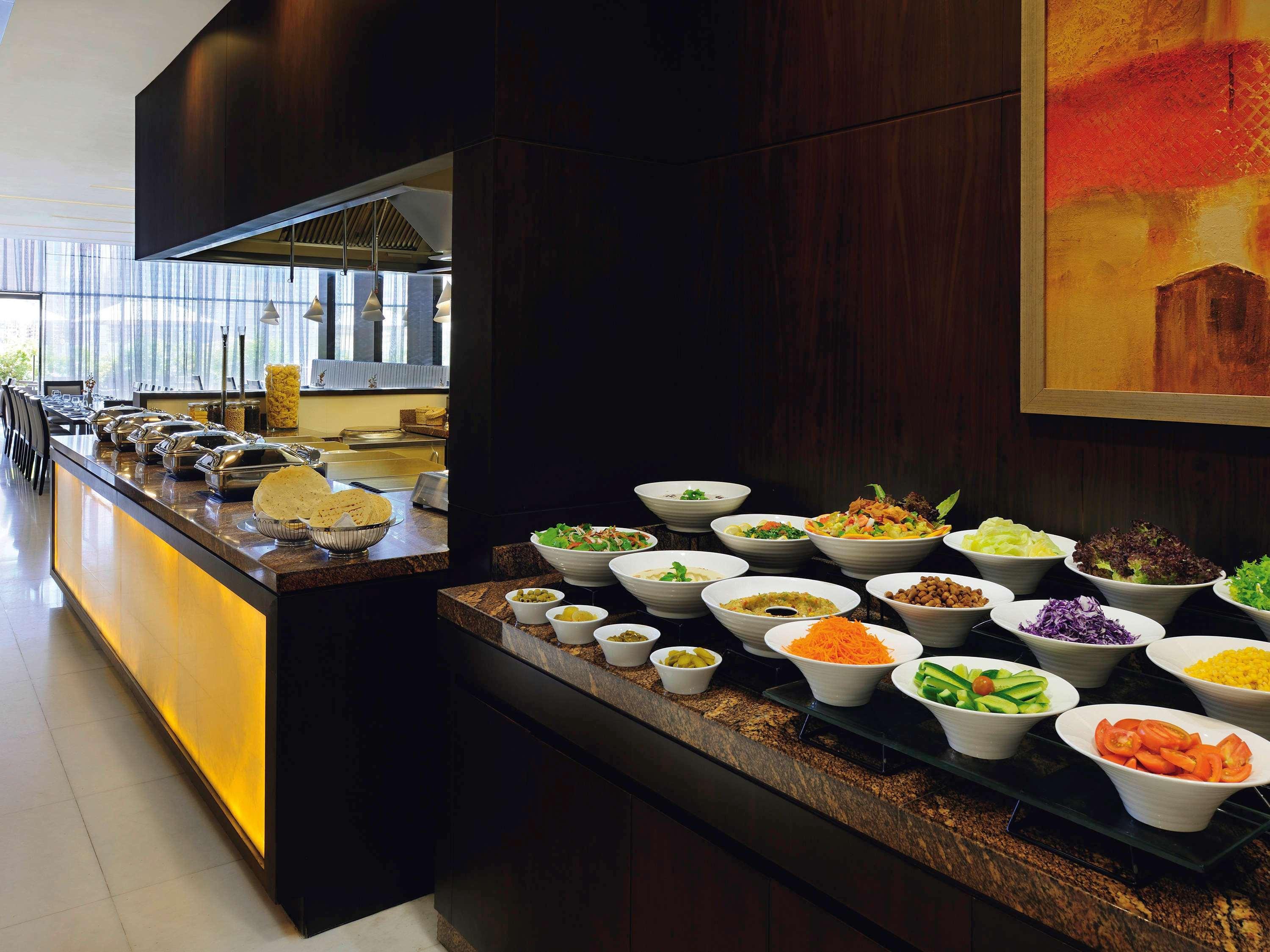 Moevenpick Hotel Apartments Al Mamzar Dubai Bagian luar foto A salad bar