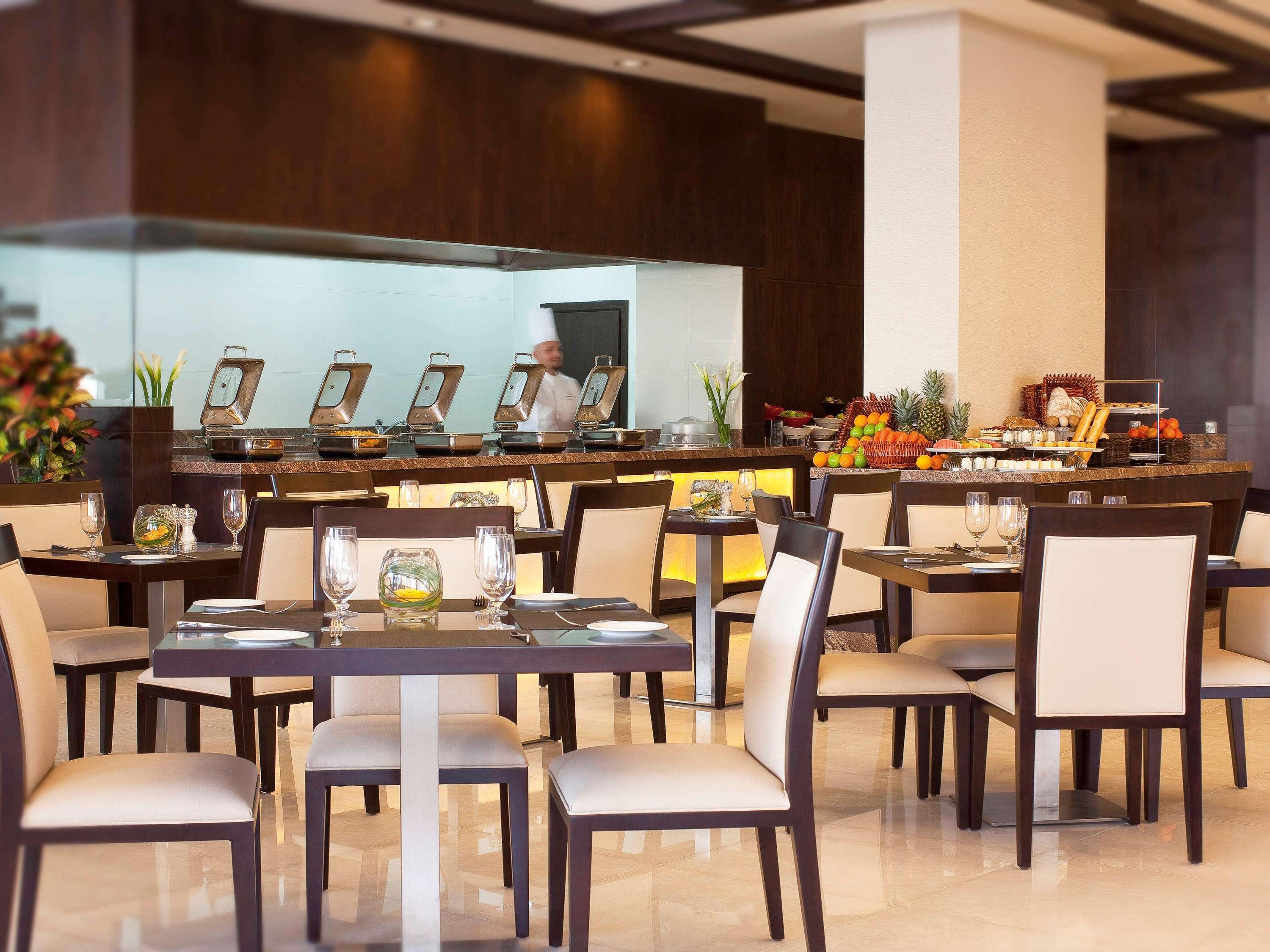 Moevenpick Hotel Apartments Al Mamzar Dubai Bagian luar foto The restaurant