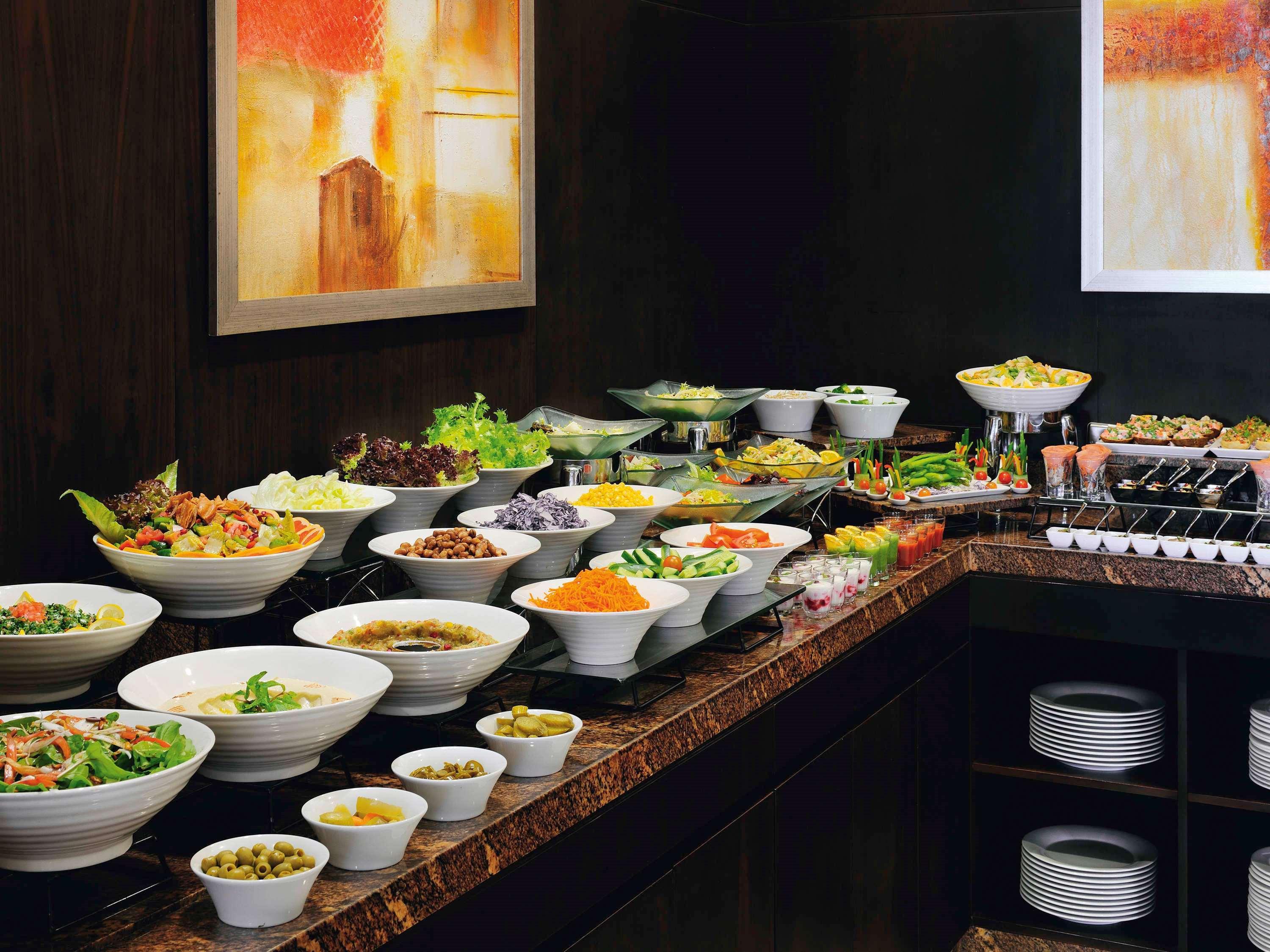 Moevenpick Hotel Apartments Al Mamzar Dubai Bagian luar foto A salad bar