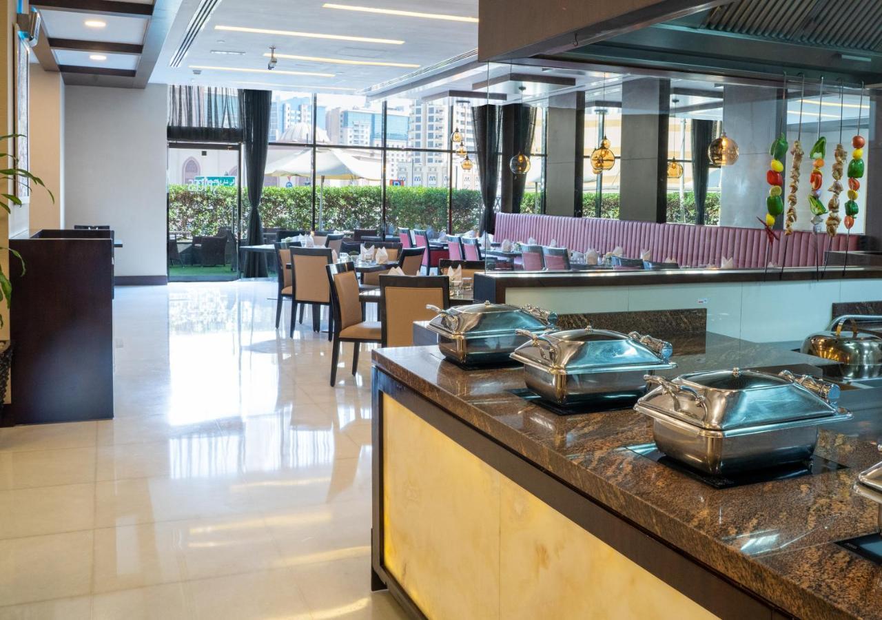 Moevenpick Hotel Apartments Al Mamzar Dubai Bagian luar foto The restaurant