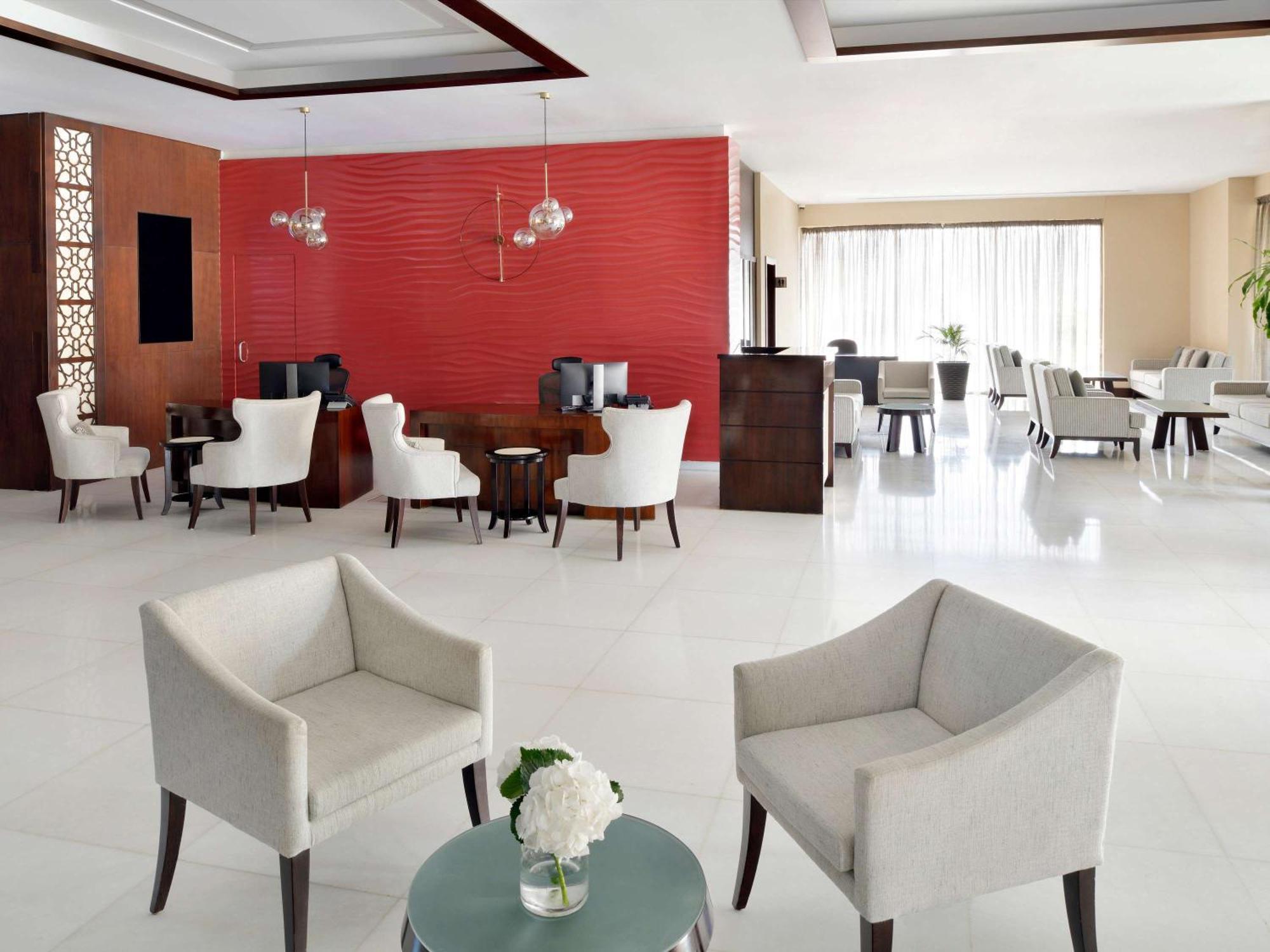 Moevenpick Hotel Apartments Al Mamzar Dubai Bagian luar foto Lobby